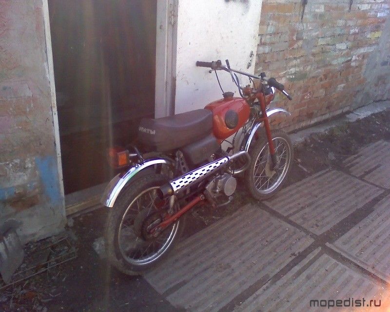 Сзади